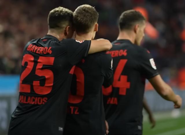 Leverkusen players celebrating.