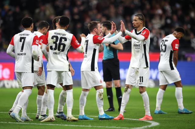 Mario Götze celebrates scoring with his SGE teammates.