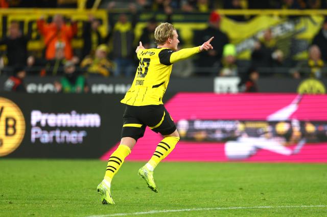 Julian Brandt celebrates scoring against Freiburg.