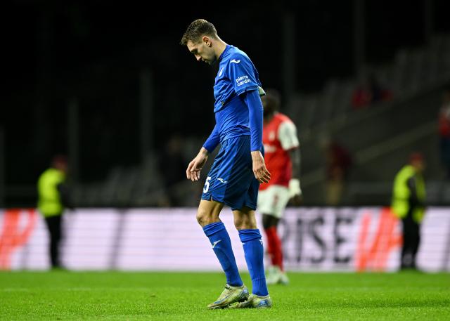 TSG defender Arthur Chaves exits the pitch dejected on Thursday night. 