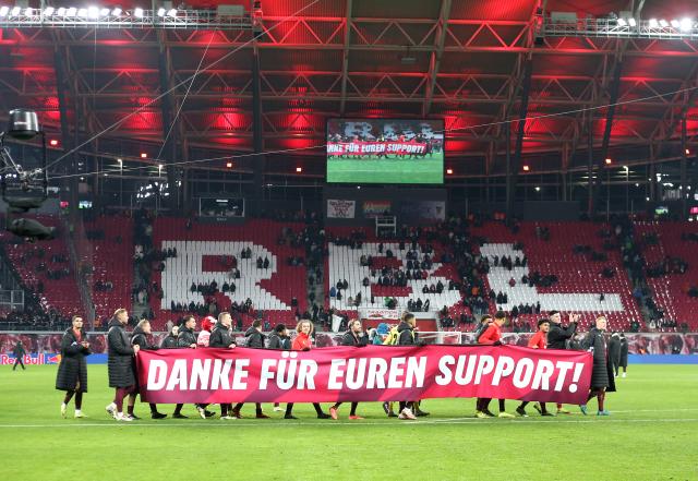 RB Leipzig players thank the hometown fans for their support at the Red Bull Arena last night. 