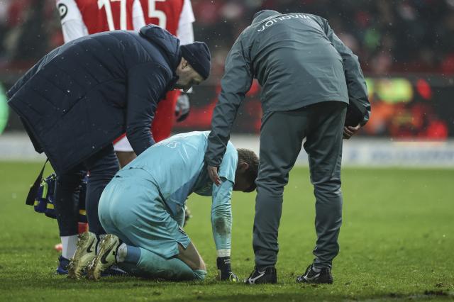 Bochum keeper Patrick Drewes receives medical attention at Stadion An der Alten Foersterei on Saturday.