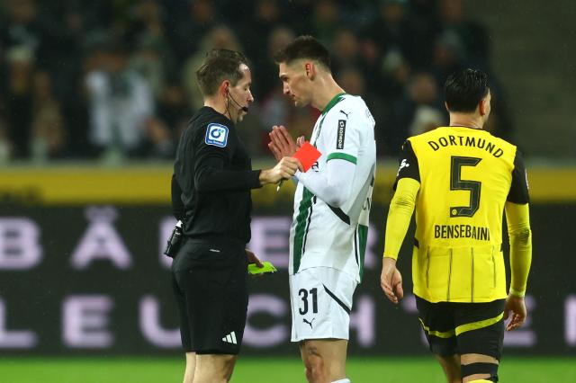 Czech striker Tomas Cvancara getting thrown off on double yellows in his last appearance for Gladbach.