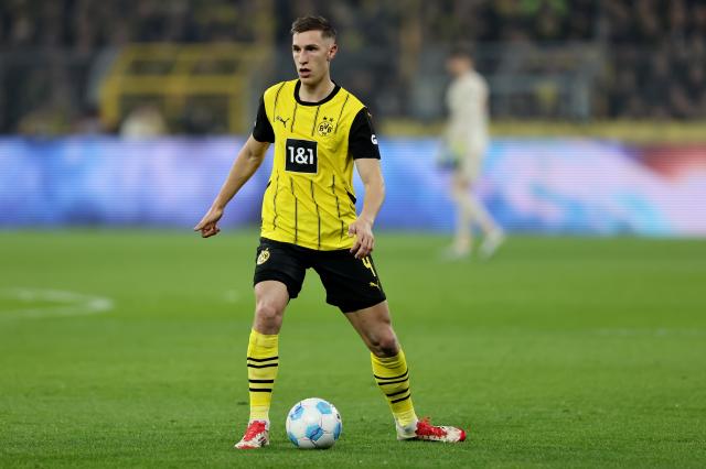 Nico Schlotterbeck of Borussia Dortmund is on the ball against Union Berlin.