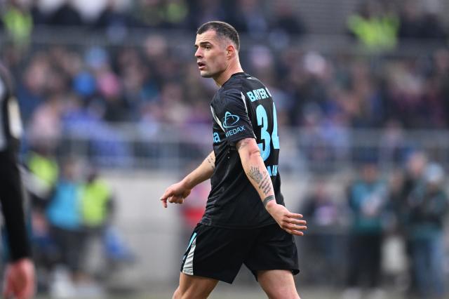 Granit Xhaka in action for Bayer Leverkusen against Holstein Kiel.